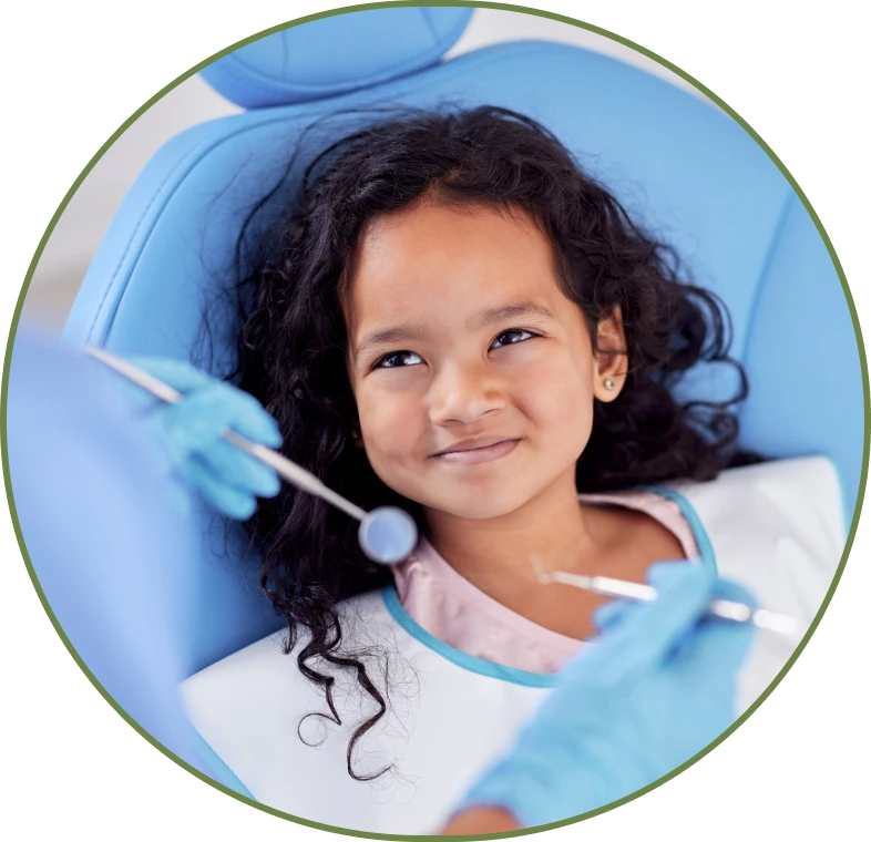 Smiling child in dental chair